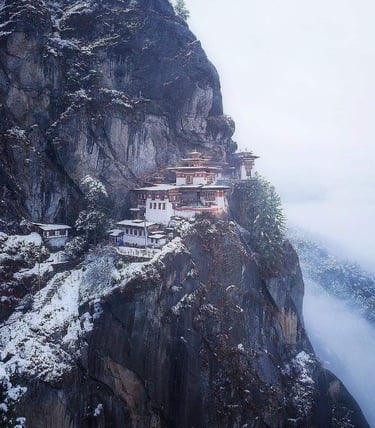 Tiger's-Nest-monastery-in-Paro-Valley-wrapped-almost-entirely-in-snow