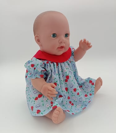 Missy Kissy is blue dress with strawberry print