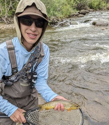 Our founder, Ayden Hutson, fishing for Trout. 