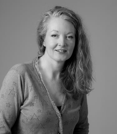 A photograph of author Alex Greyson