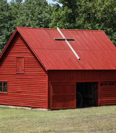 Old red barn painted with a heritage breathable paint