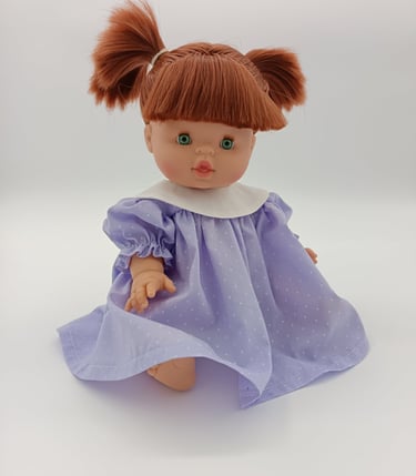 Minikane doll in round collar dress