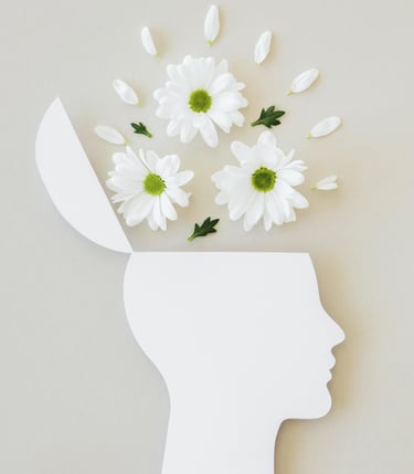 a white head with flowers in a white headpiece