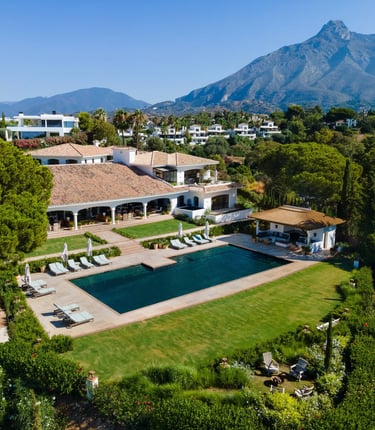 Aerial view of Villa La Gratitud with La Concha backdrop