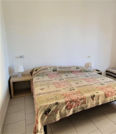 a bed with a couch and a couch