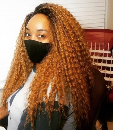 a woman with blonde crochet 