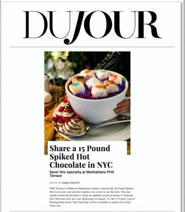 a magazine cover of a magazine with a cup of coffee and a dessert