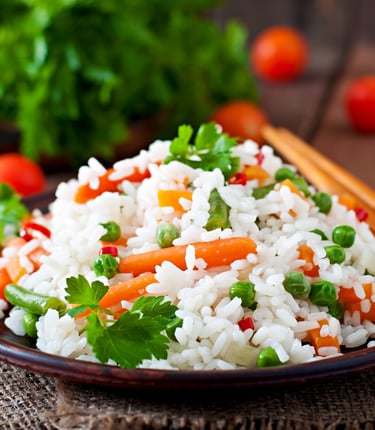 a plate of fried rice made with sona masoori rice at home.