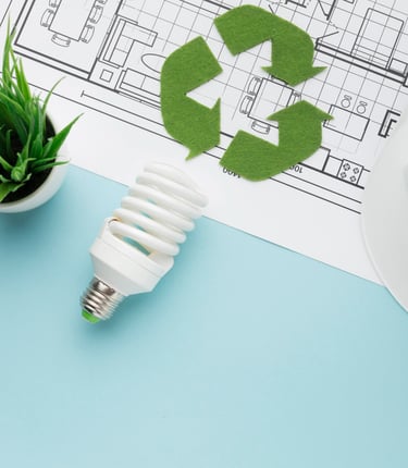 a white hard hat with a green plant in the middle