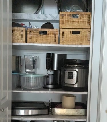 Organized kitchenware closet with strong shelving
