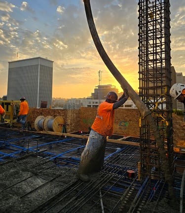 a man is working a large cement pump