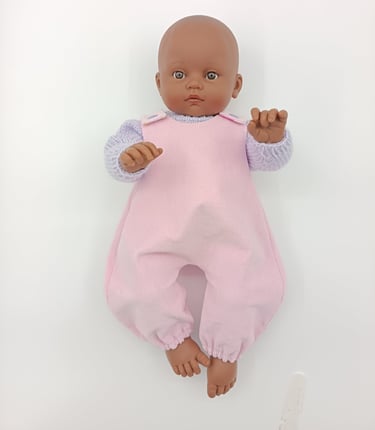 Minikane toddler doll in pink dungarees and lilac knitted jumper made for Baby Born
