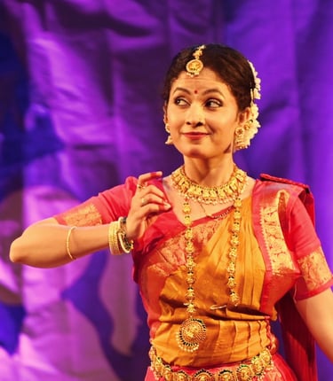 Indian classical dance performer honoring Lord Nataraja in a traditional pre-performance ritual.