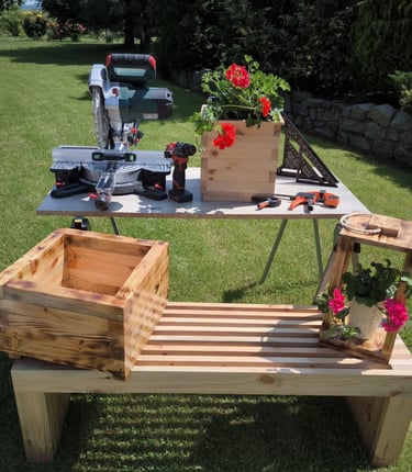 a bench with a planter and a potted planter