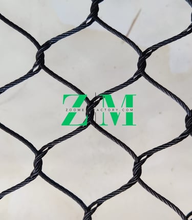 Durable black knotted nylon bird netting for garden and farm protection with a diamond mesh pattern.