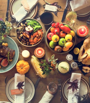 Order traditional Thanksgiving dinner featuring roasted turkey, beef, and autumn side dishes.