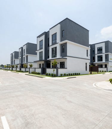 Wide-angle exterior shot of a luxury housing development with clean concrete roads, Serpong.