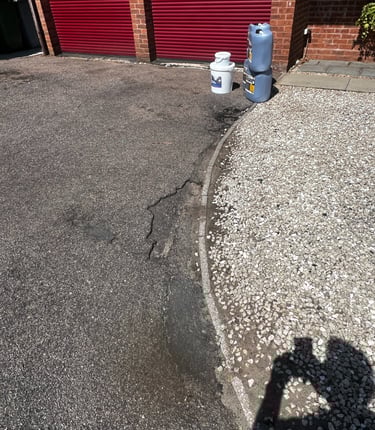 <img src="tarmac-driveway.jpg" alt="Old driveway before restoration" />