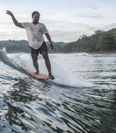 Ucup longboard surf lessons in Batukaras