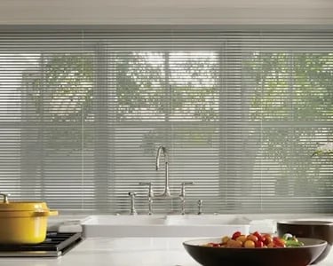 kitchen window with light-filtering blinds above sink – Rise Up Window Coverings Milwaukee