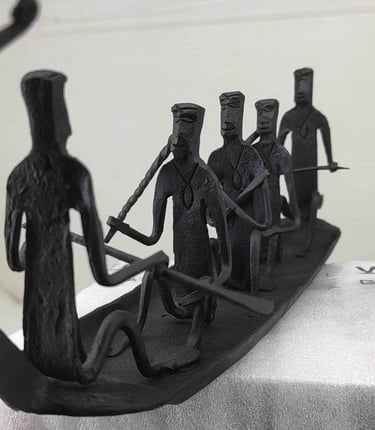"Bastar tribal iron boat with 5 seated figures – handcrafted Loha Shilp sculpture-Export-ready"
