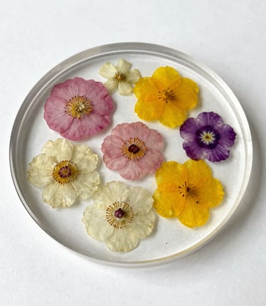 a table with flowers and leaves