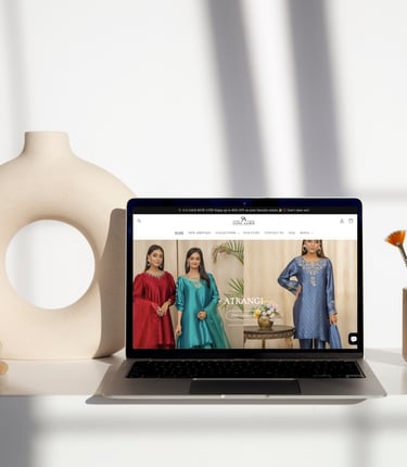 A picture on a laptop showing sadiaaamir.com website that was made by TDW