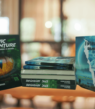 a table with books and a book on it. The books are Epic Adventure and Entre dois Mundos