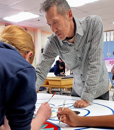 Arturo Ho works with students at Armistead Gardens (credit Jane Barbacane)
