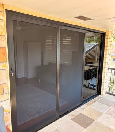 Sliding door with security screens