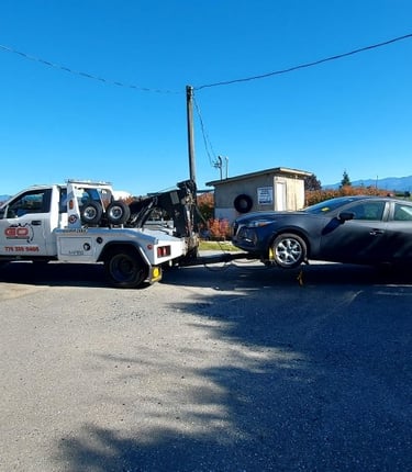Car being towed in Langley BC roadside assistance