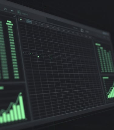Digital dashboard with green charts and financial data analytics on a dark screen.