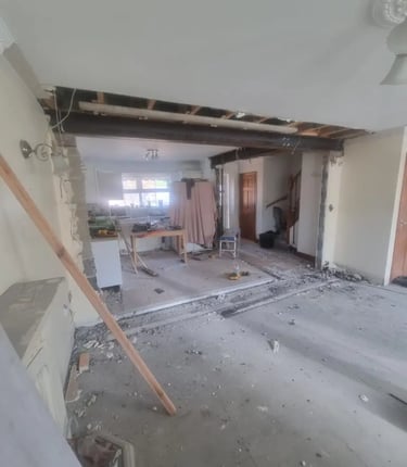 A home kitchen renovation featuring a structural steel RSJ beam installation after wall removal.