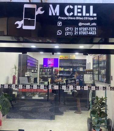 Storefront of M Cell, a mobile phone repair shop in Brazil featuring smartphone accessories and service technicians.