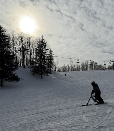 Ben Jones riding a snow bike