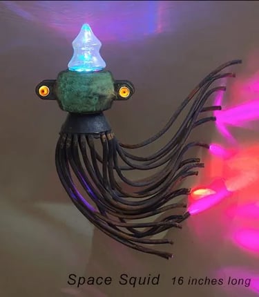 Wall mounted lighted assemblage sculpture of sea creature by Santa Barbara artist Tal Avitzur.