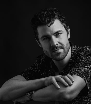 a man with a watch on his wrist fashion shoot creative