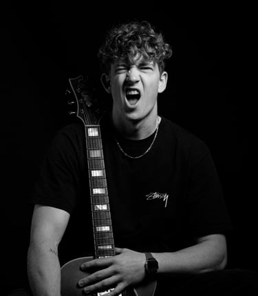 a man with a guitar and a guitar