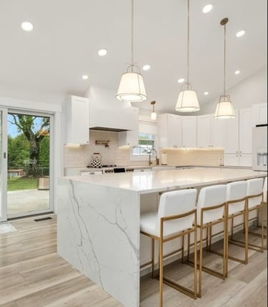 a kitchen with a marble counter top and a marble counter top