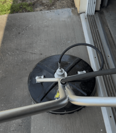 a pressure wash equipment with a handlebar and a handlebar