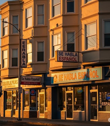 a store front of a building with a clock on the front and signs