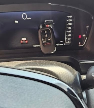 Smart key programming in Marion NC with key fob on vehicle dashboard