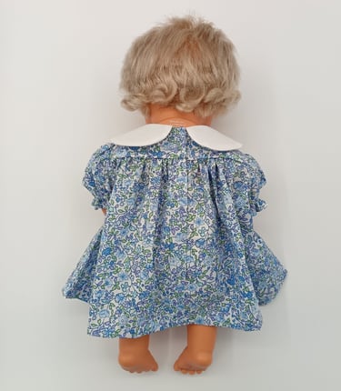 Back view of blue floral dress