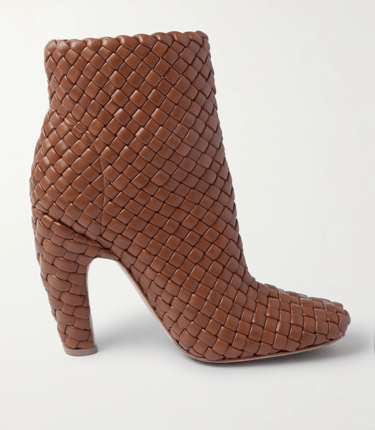 Luxury brown woven leather ankle boot with a curved heel.