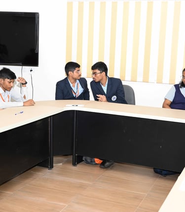 Student contestants engaged in the preliminary quiz round of BPMMQ!