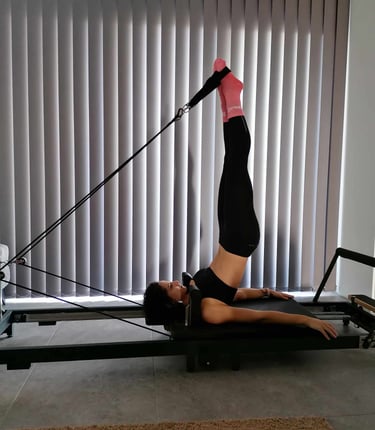 long spine stretch on the reformer