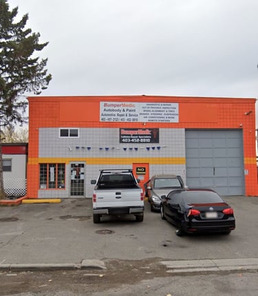 BumperMedic autobody and paint shop offering automotive repair services with cars parked in the lot.