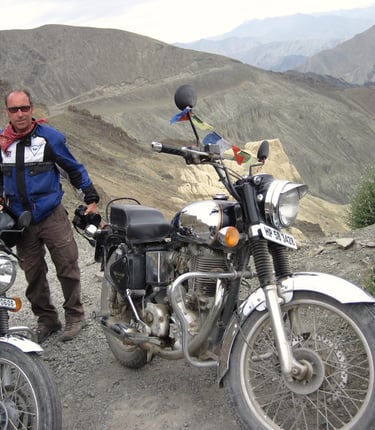 Diego Escriva de Romani leading a motorcycle tour high in the Himalayas