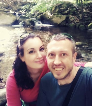 A photo of smiling man and woman