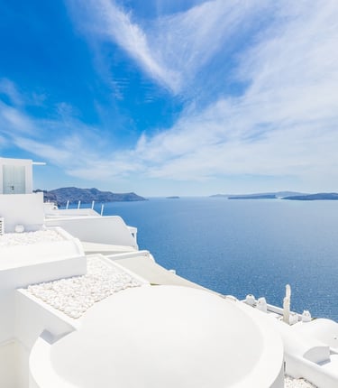 Santorin a white house with a view of the ocean